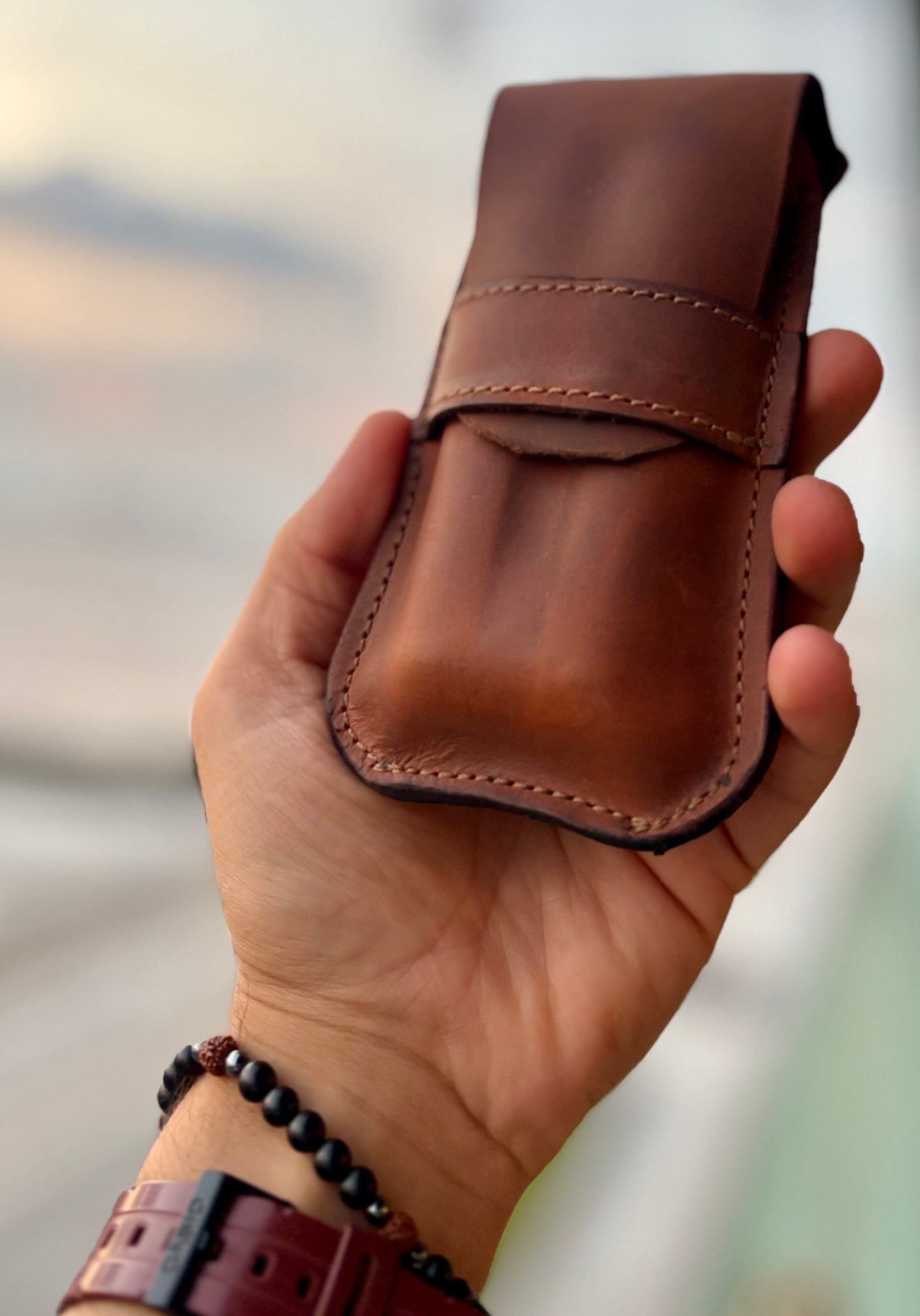 A - the Churchill cigar pouch